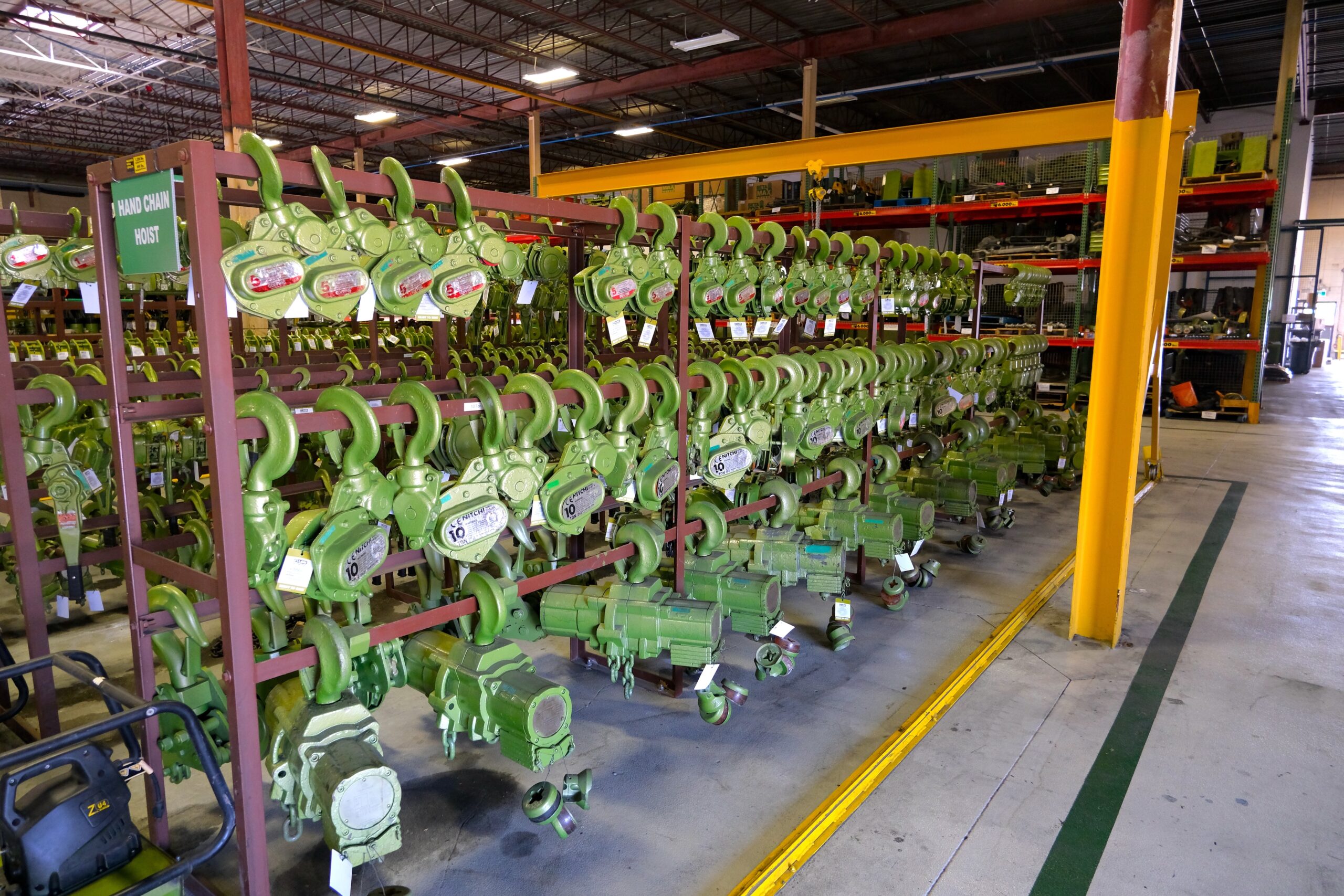 A shelf full of various chain hoists inside the LGH rental center.