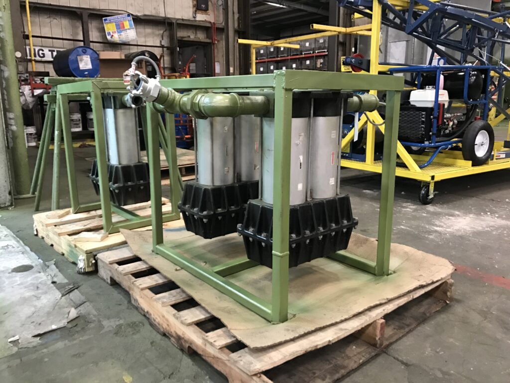 Photo inside the LGH Rental Center warehouse of two La-Man compressed air filter dryer system rentals from LGH.