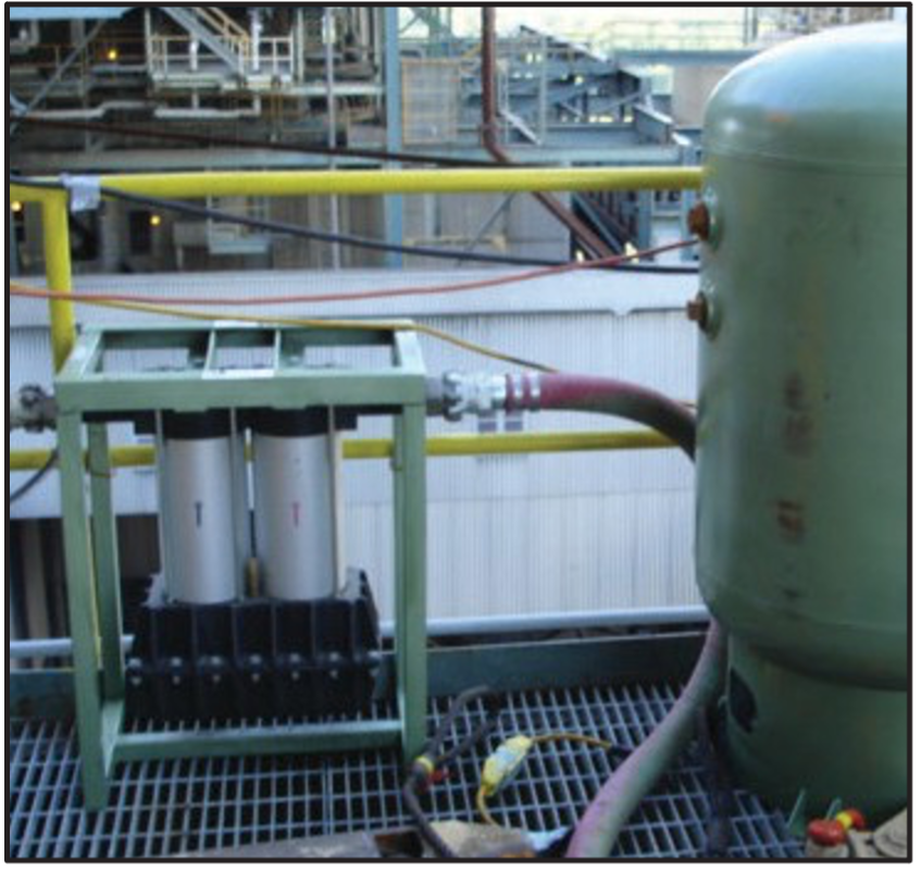 An air tank and compressed air dryer system from LGH on a jobsite.