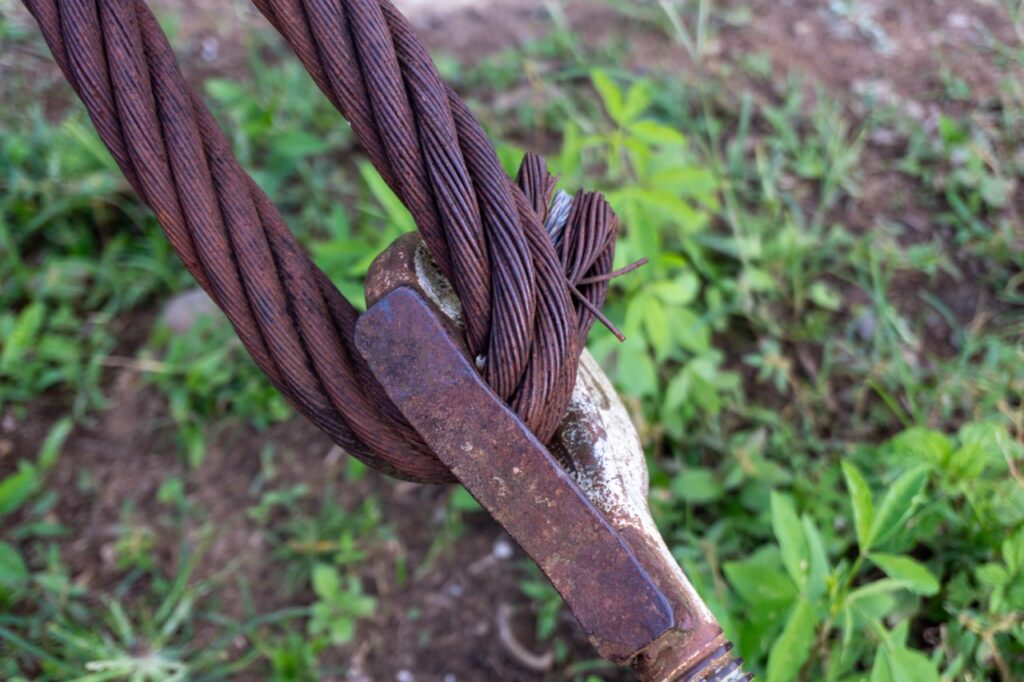 A stock photo of a damaged wire rope sling