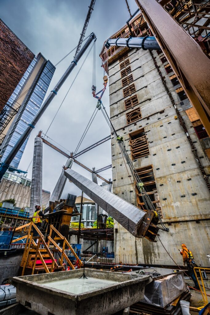 A sheave block pulley and air chain hoists from LGH helping to rig and lift a heavy column.