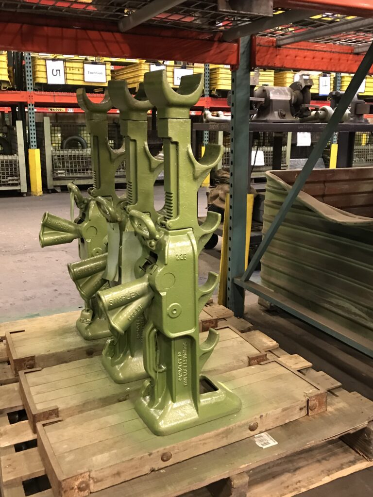 Photo of green Simplex mechanical reel jack rentals in the LGH warehouse.