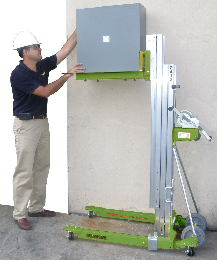 Jobsite photo of a Sumner 2412 material lift in LGH green.