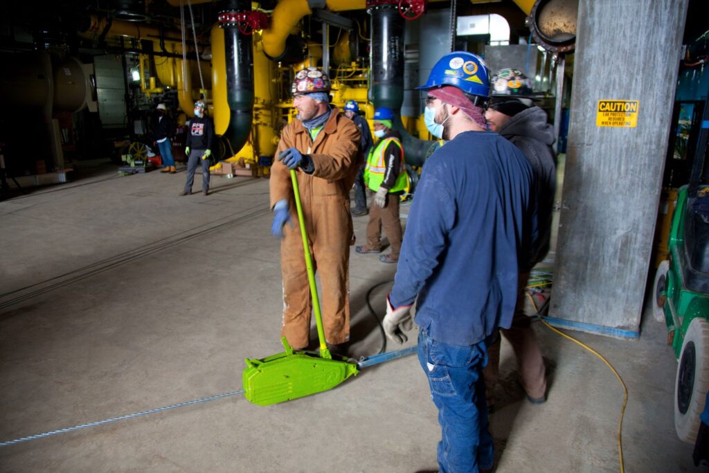 A Tirfor, aka a griphoist, being used to move a chiller on an industrial jobsite in Chicago.