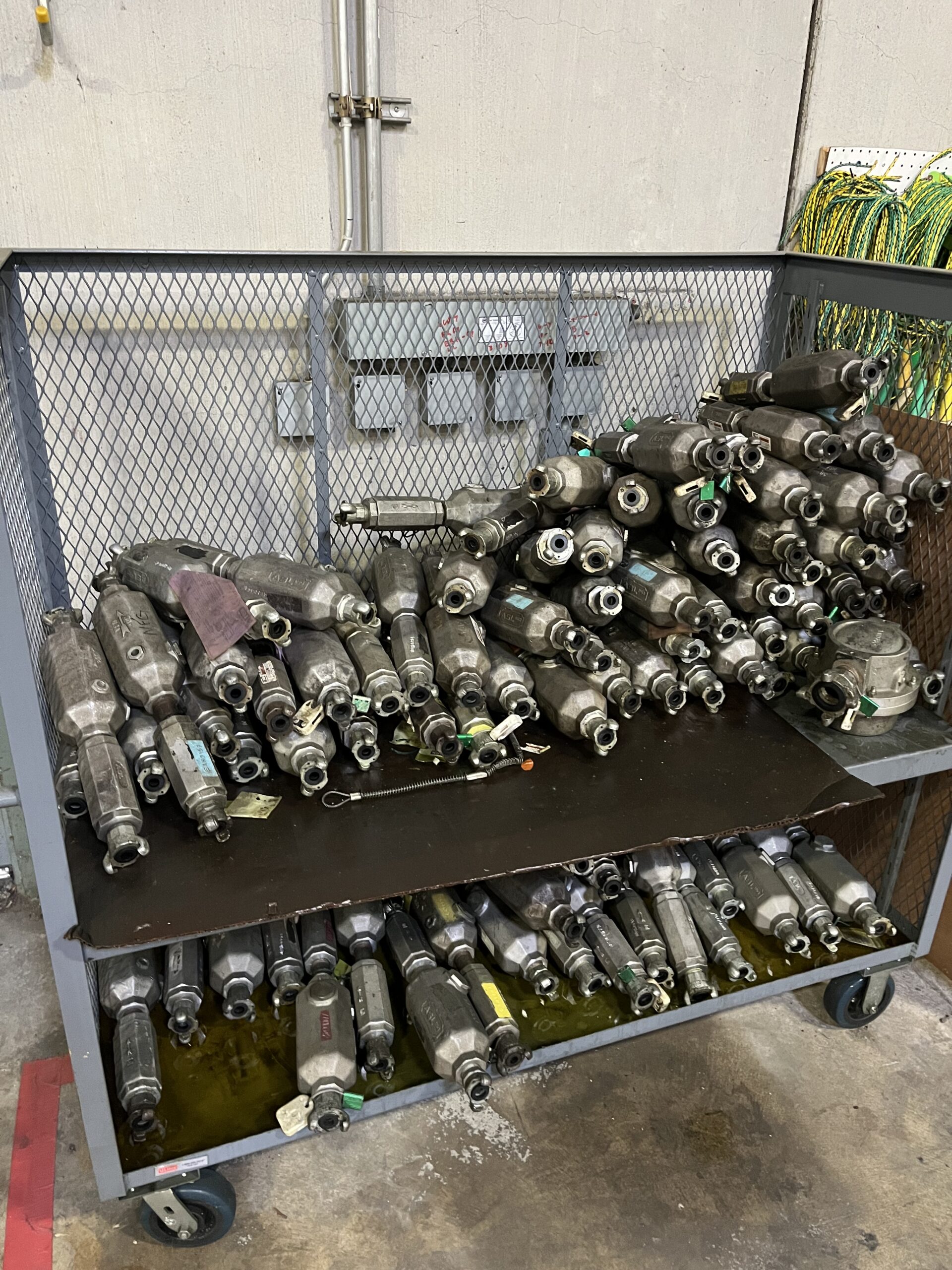A photo of a rack of pneumatic oilers and dirt stoppers inside the LGH warehouse.