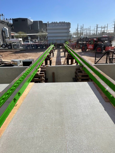 Hydra-Slide HT500 skidding system rental from LGH, spanning an unsupported gap.