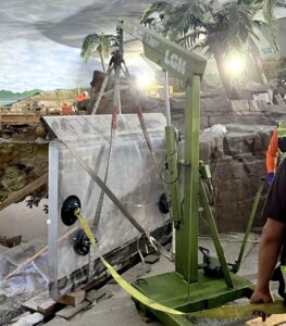 LGH floor crane lifting a glass panel for new shark exhibit at SeaWorld San Diego