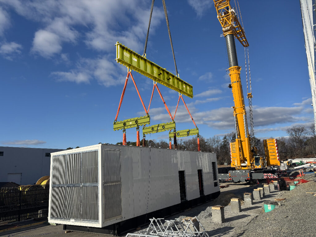 Rigging equipment rentals from LGH helping to lift a chiller on a data center.