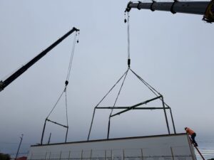 X beam crane pick lift on jobsite