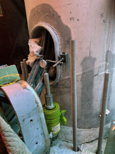 Monopole reinforcement project pull testing with hydraulic ram Swift Underground