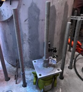 Monopole reinforcement project pull testing with hydraulic ram Swift Underground
