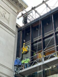Beta max hoist being used to install windows at the Chicago Art Institute