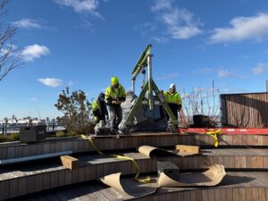 Workers use LGH gantry crane to install a statue at a museum