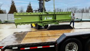 LGH multilug lifting beam being loaded onto flatbed truck